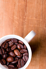 Image showing cup full of coffee beans 