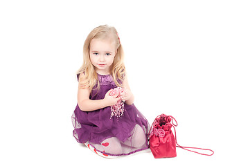 Image showing Studio shot of baby girl in gala dress