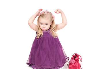Image showing Studio shot of baby girl in gala dress