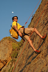 Image showing Rappelling with the Moon