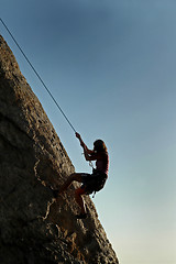 Image showing Silhouette Woman Climbing