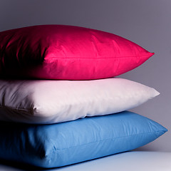 Image showing pink, white and blue pillows