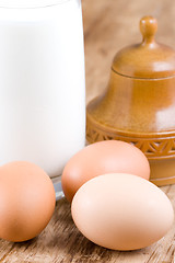 Image showing brown eggs and glass of milk 