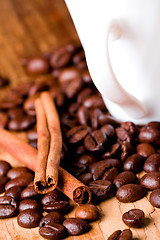 Image showing coffee beans, cup and cinnamon