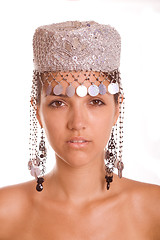 Image showing Beautiful young model in hat on the white background.