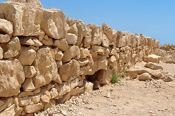 Image showing Broken wall of ancient fortress ruin converging in perspective