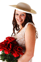 Image showing Woman with hat and roses.