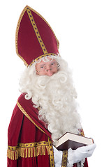 Image showing Sinterklaas and his book