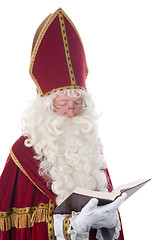Image showing Sinterklaas and his book