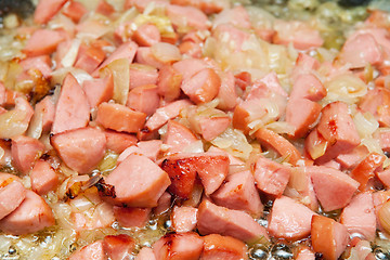 Image showing Sausages with onion