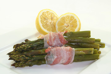 Image showing green asparagus in bacon coat