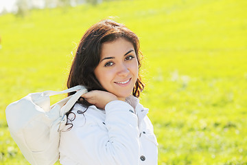 Image showing Young woman with white bag