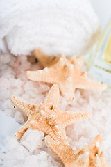 Image showing seasalt, towel and starfish