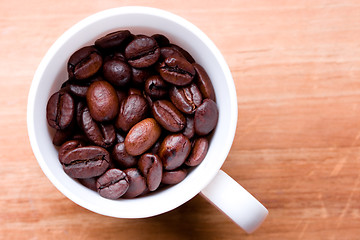 Image showing cup full of coffee beans