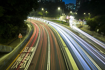 Image showing Modern Urban City with Freeway Traffic at Night