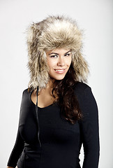 Image showing Girl with a fur hat