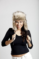 Image showing Girl with a fur hat