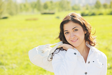 Image showing Young cute woman with white bag