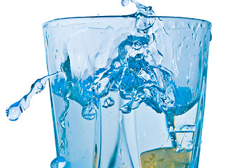 Image showing Sparks of blue water on a white background