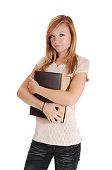 Image showing Girl holding big book.