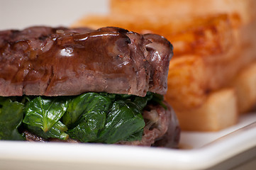 Image showing Steak medallions and fries