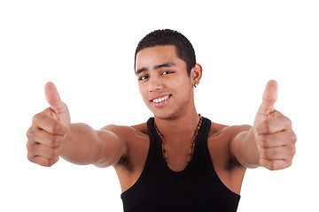 Image showing Young latin man with thumbs raised as a sign of ok