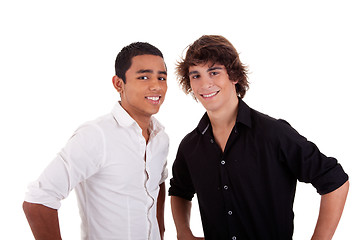 Image showing friends: two young man of different colors,looking to camera and smiling