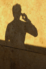 Image showing Man Shadow on Phone