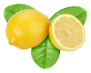 Image showing Yellow lemon with green leaf