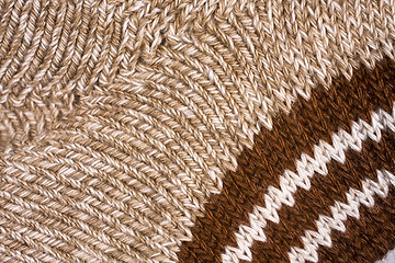 Image showing Stockinette of yellow melange mohair yarn as background