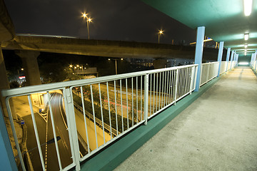 Image showing view on footbridge of modern urban city with Freeway Traffic at 
