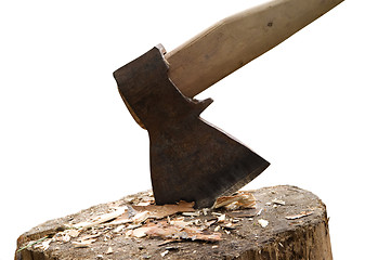 Image showing Axe in log