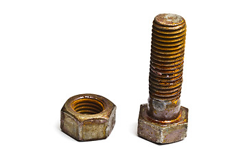 Image showing Rusty nut and bolt on white 