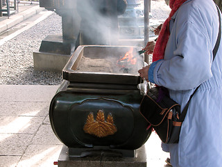 Image showing Burning incenses