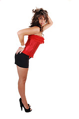 Image showing Pretty girl in red corset.