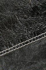 Image showing Stitch on shiny black leather