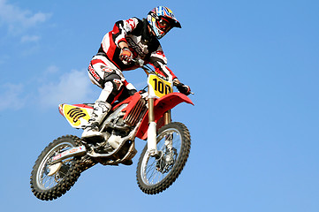 Image showing red motocross in the sky