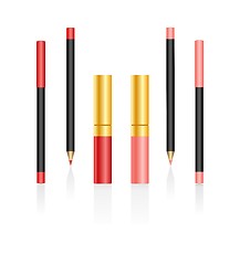 Image showing Lipsticks and pencils isolated on a white background
