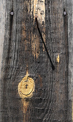 Image showing Old board with knot