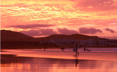 Image showing orange sunset in playa Famara, Lanzarote 