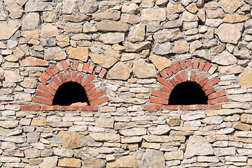 Image showing Lime wall with small windows