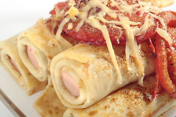 Image showing Pancakes with sausages and tomatoes