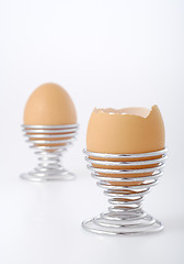Image showing Eggs in wire eggcup