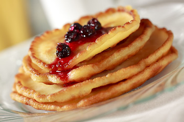 Image showing Pile of pancakes with fruit sauce