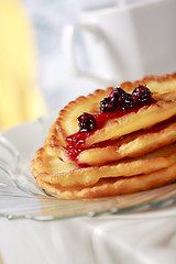 Image showing Pile of pancakes with fruit sauce