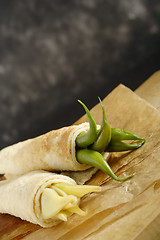 Image showing Pancakes wrapped bean's pods