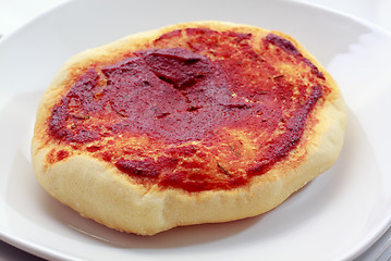 Image showing Small pizza (pizzette) on plate