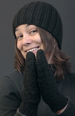 Image showing Smiling woman in woolen cap