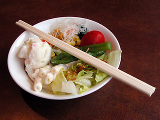 Image showing Salad and chopsticks