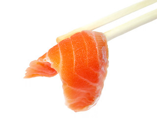 Image showing Salmon meat in chopsticks